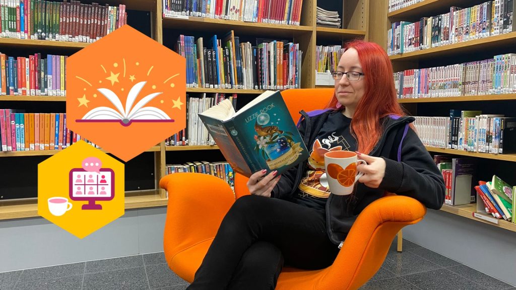 Katja lukee kirjaa kahvikuppi kädessä oranssilla tuolilla Karjasillan kirjastossa.